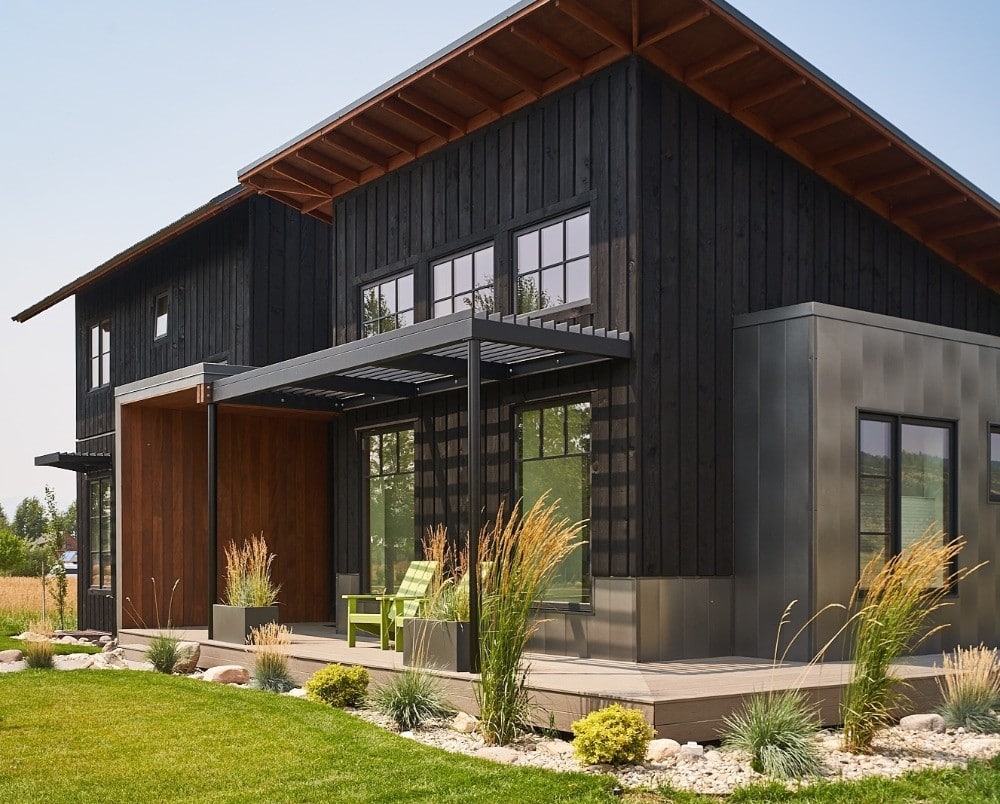 A Farm House with Black Siding
