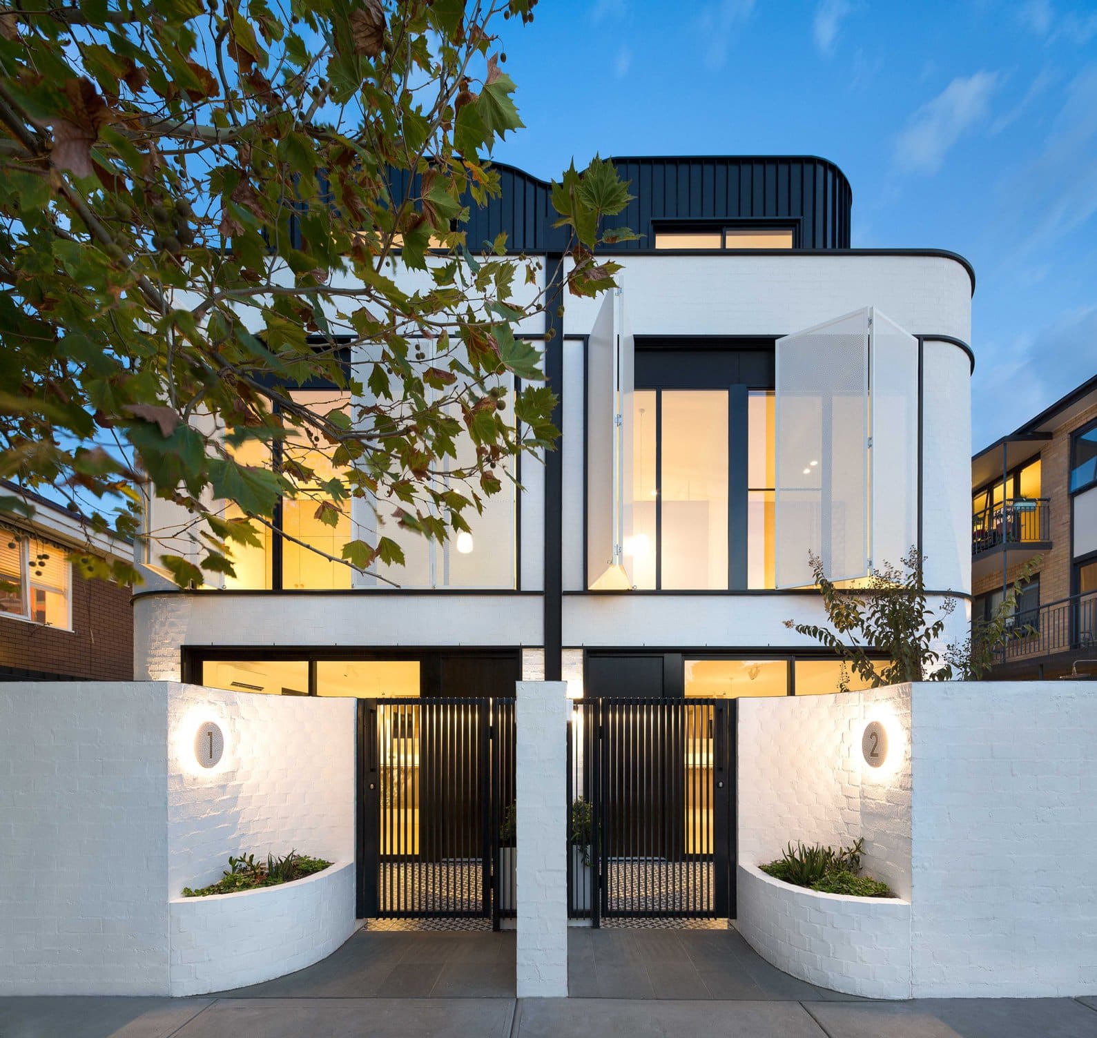 white houses with black windows